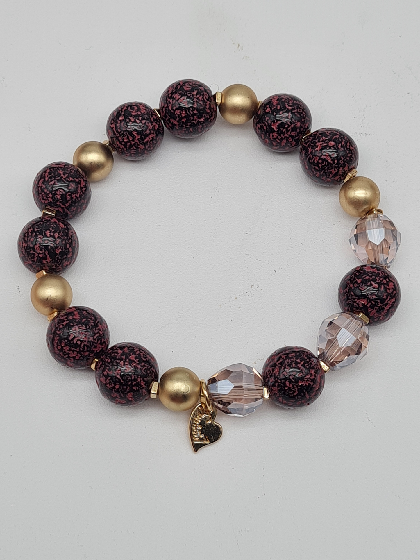 Sweet 7, Armband, elastisch, Lila-Schwarz mit goldene Perlchen