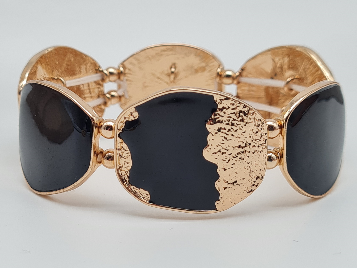 Amorino Armband, elastisches Armband Schwarz mit Goldene Verzierungen