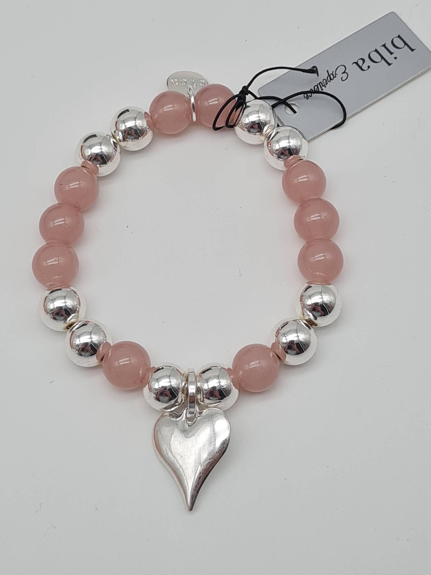 Biba Armband elastisch Silberfarben mit Rosa und Herz Anhänger
