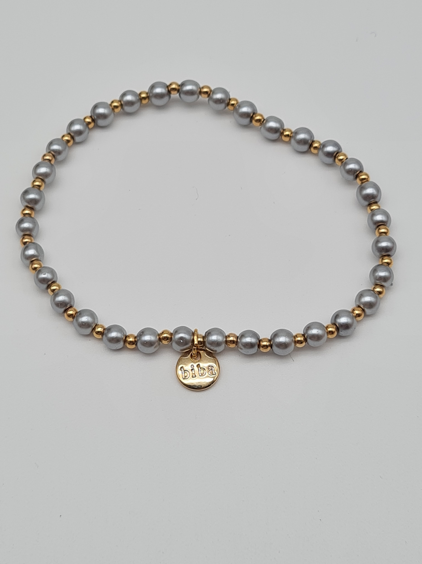 Biba Armband elastisch Silbergrau mit Goldfarben in 3 Größen