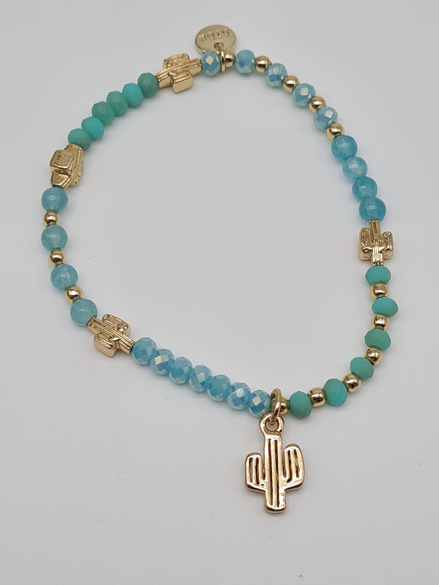 Biba Armband elastisch Creme, Türkis, mit Anhänger Seestern, Palme oder Kaktus