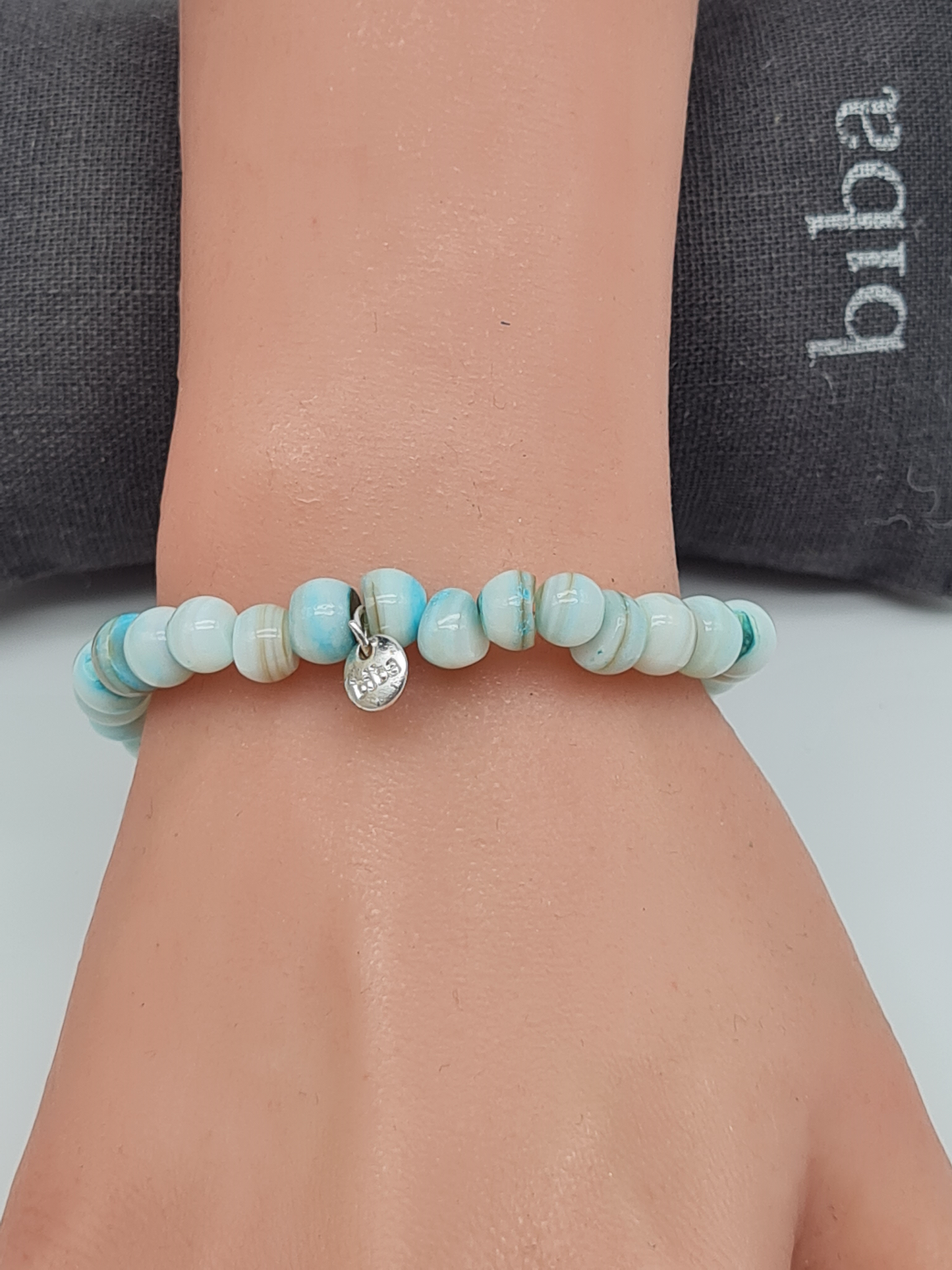 Biba Armband elastisch ein Wolkenhimmel am Arm, Hellblau