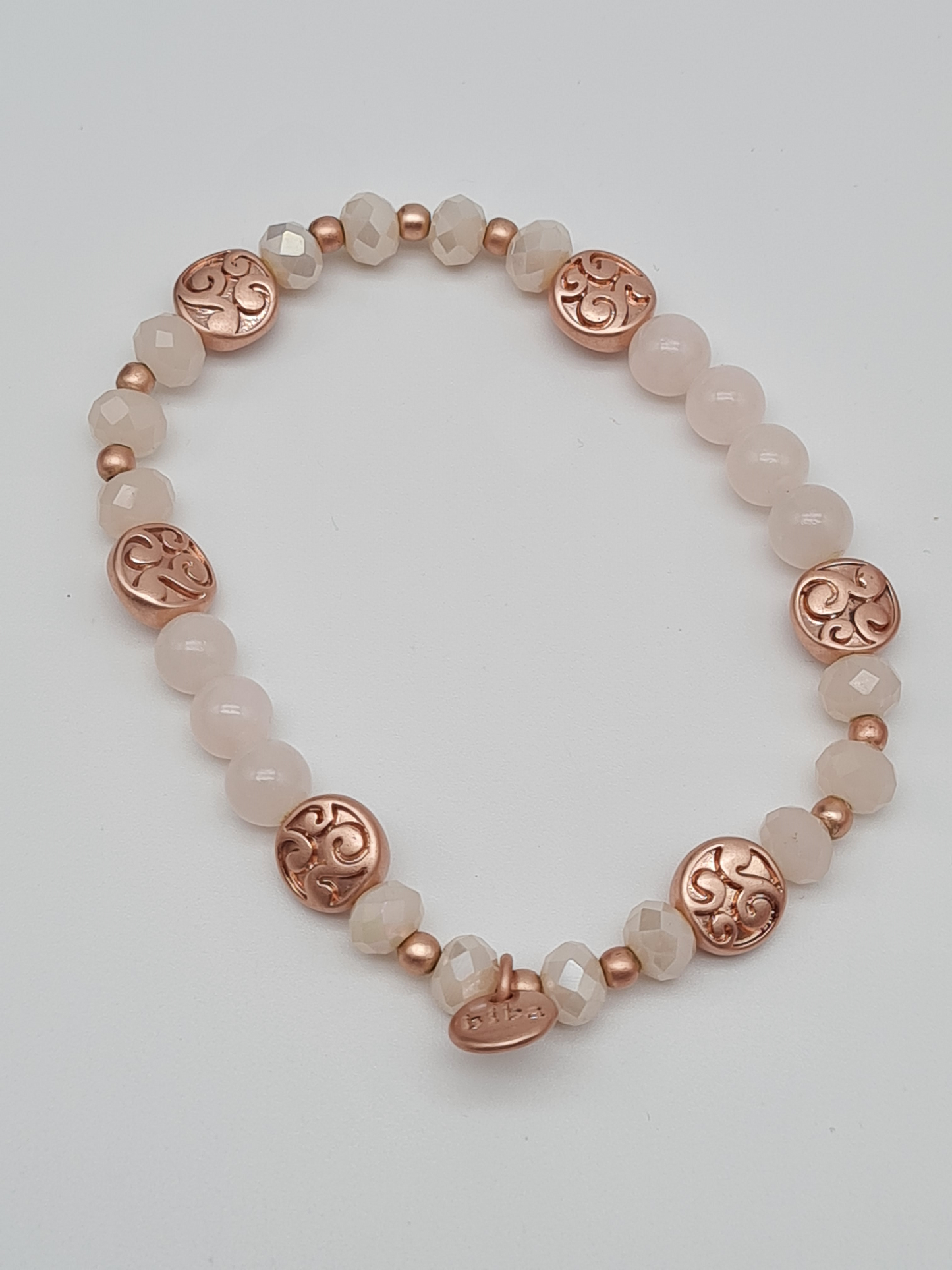 Biba Armband elastisch Perlmutt und Goldkupfer, verschiedene Zierelementen