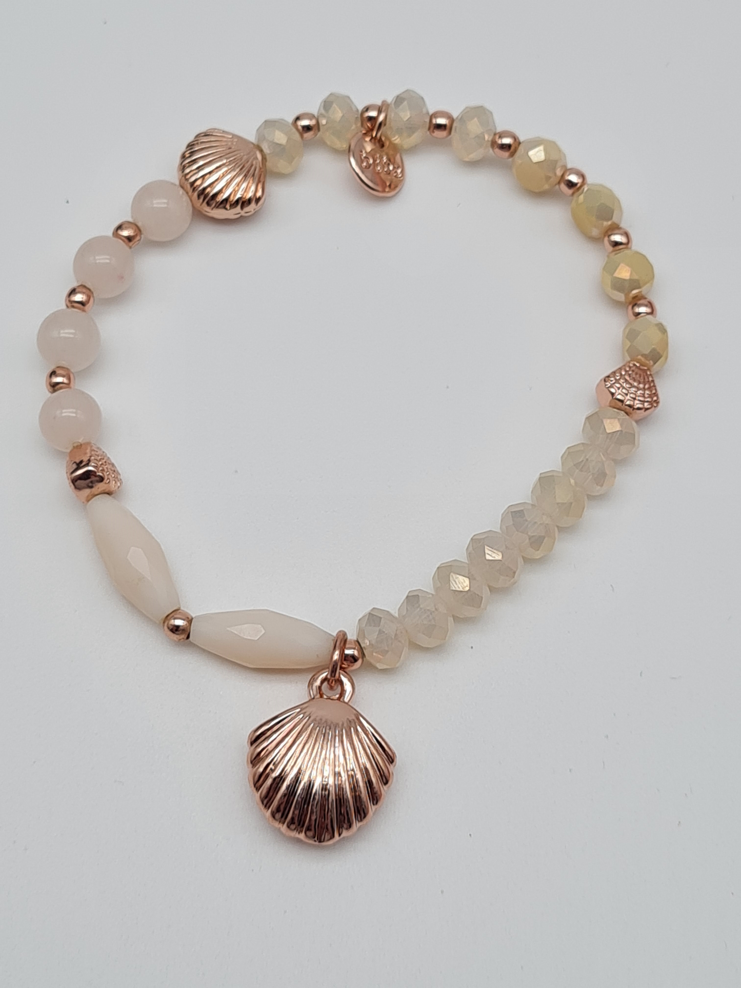 Biba Armband elastisch Perlmutt und Goldkupfer, verschiedene Zierelementen