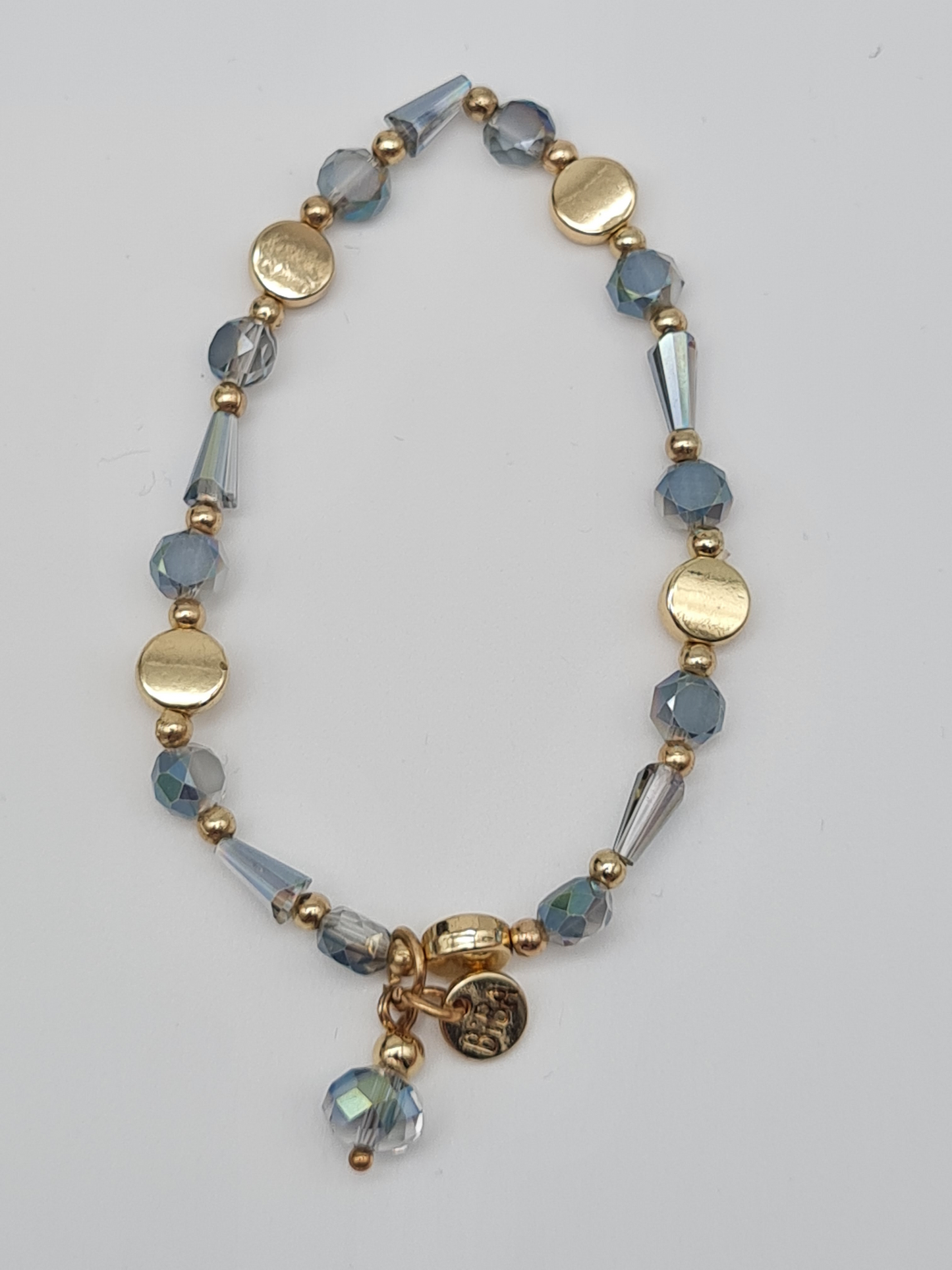 Biba Armband elastisch Hellblaue Transparente Goldene oder Roségoldene Elementen mit Anhänger