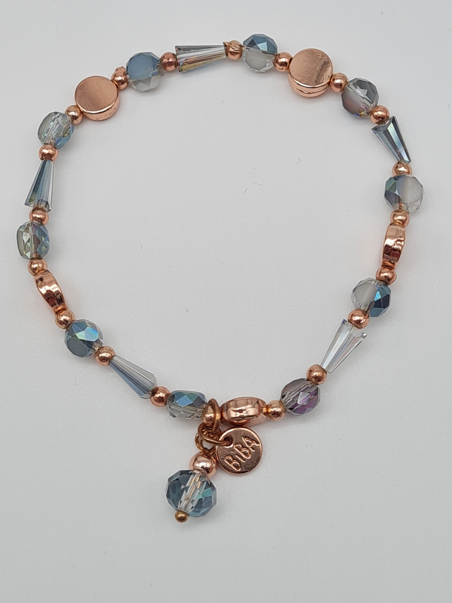 Biba Armband elastisch Hellblaue Transparente Goldene oder Roségoldene Elementen mit Anhänger