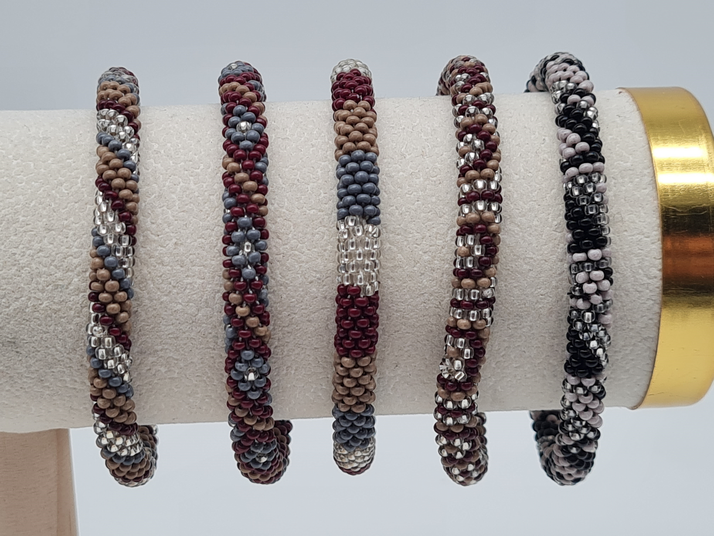 Biba Armband Roll-Armbänder in Bordeaux, Taupe und Silber Töne, verschiedene Muster