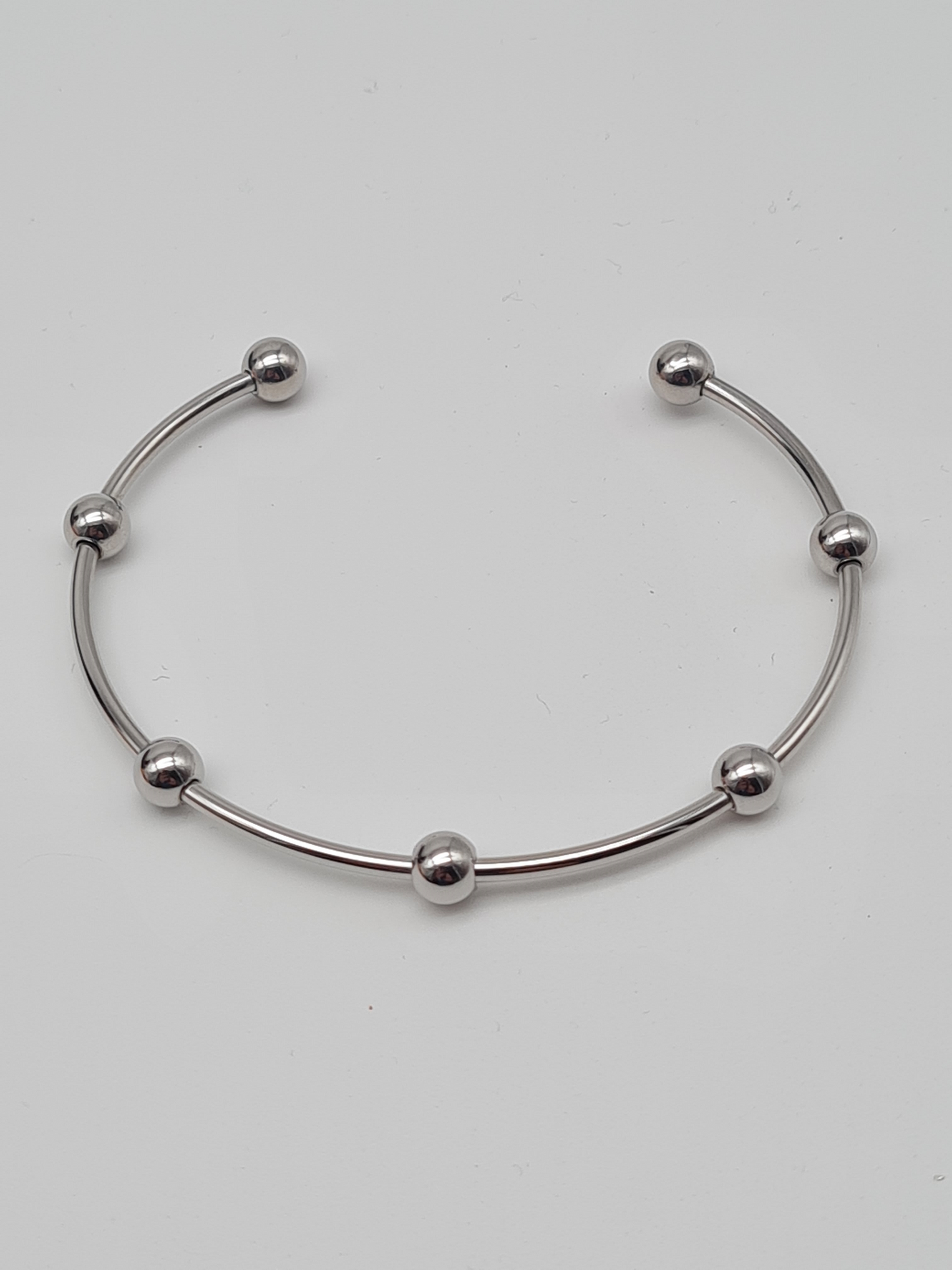 Cosmos Armreif Silber- Goldfarben nickelfrei Verzierungen Modern schlicht elegant kombinierbar