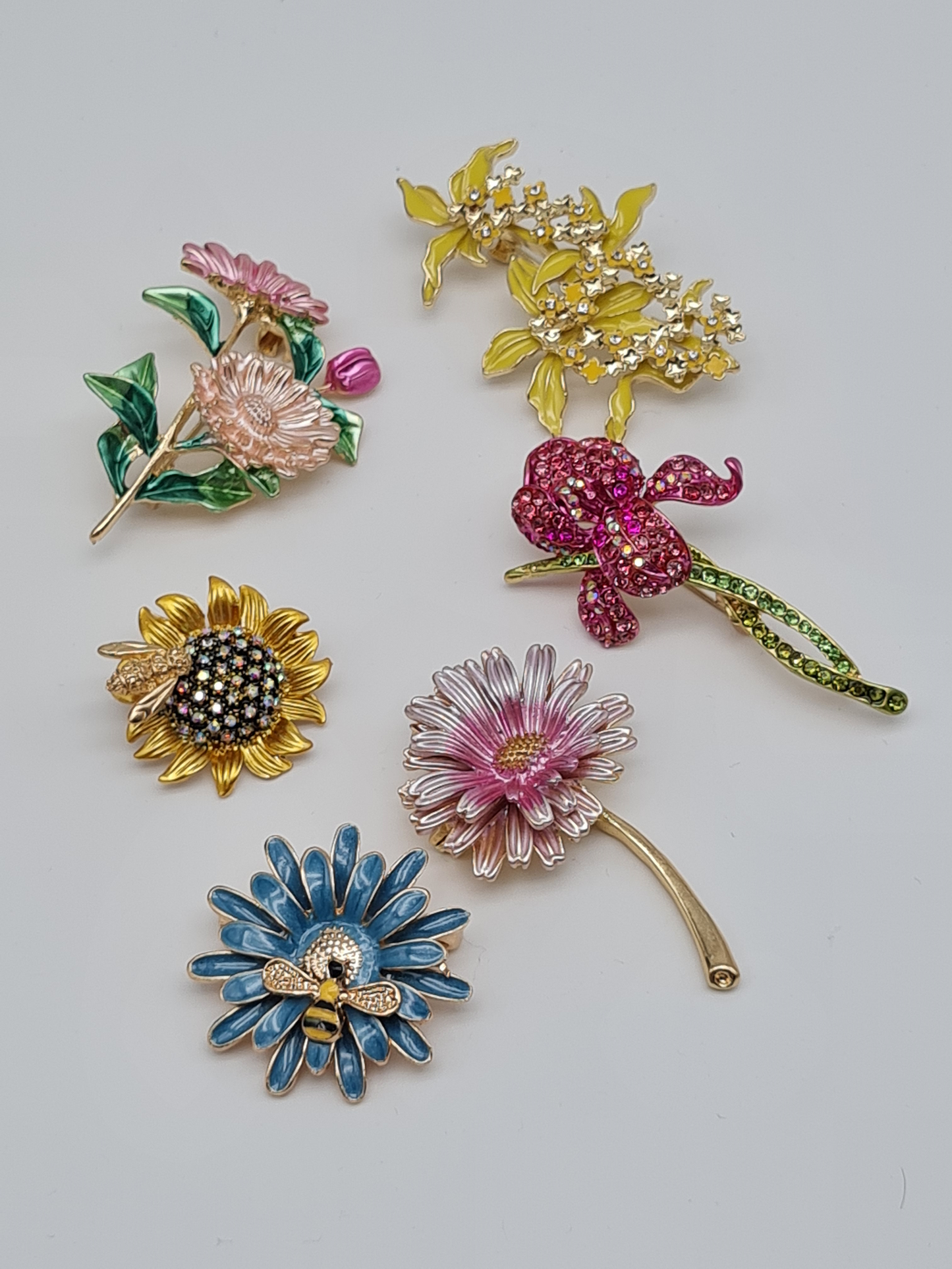 Brosche löwenzahn sonnenblume iris orchidee vanilleblüme aster gänseblümchen modeschmuck