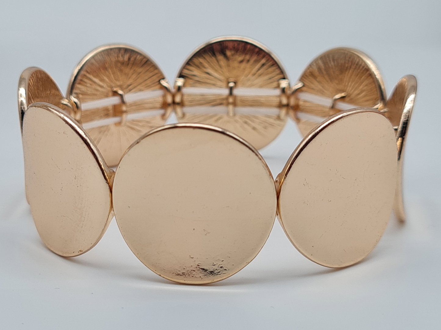 Amorino Armband, elastisch mit Goldfarbene glänzenden Kreis Elementen