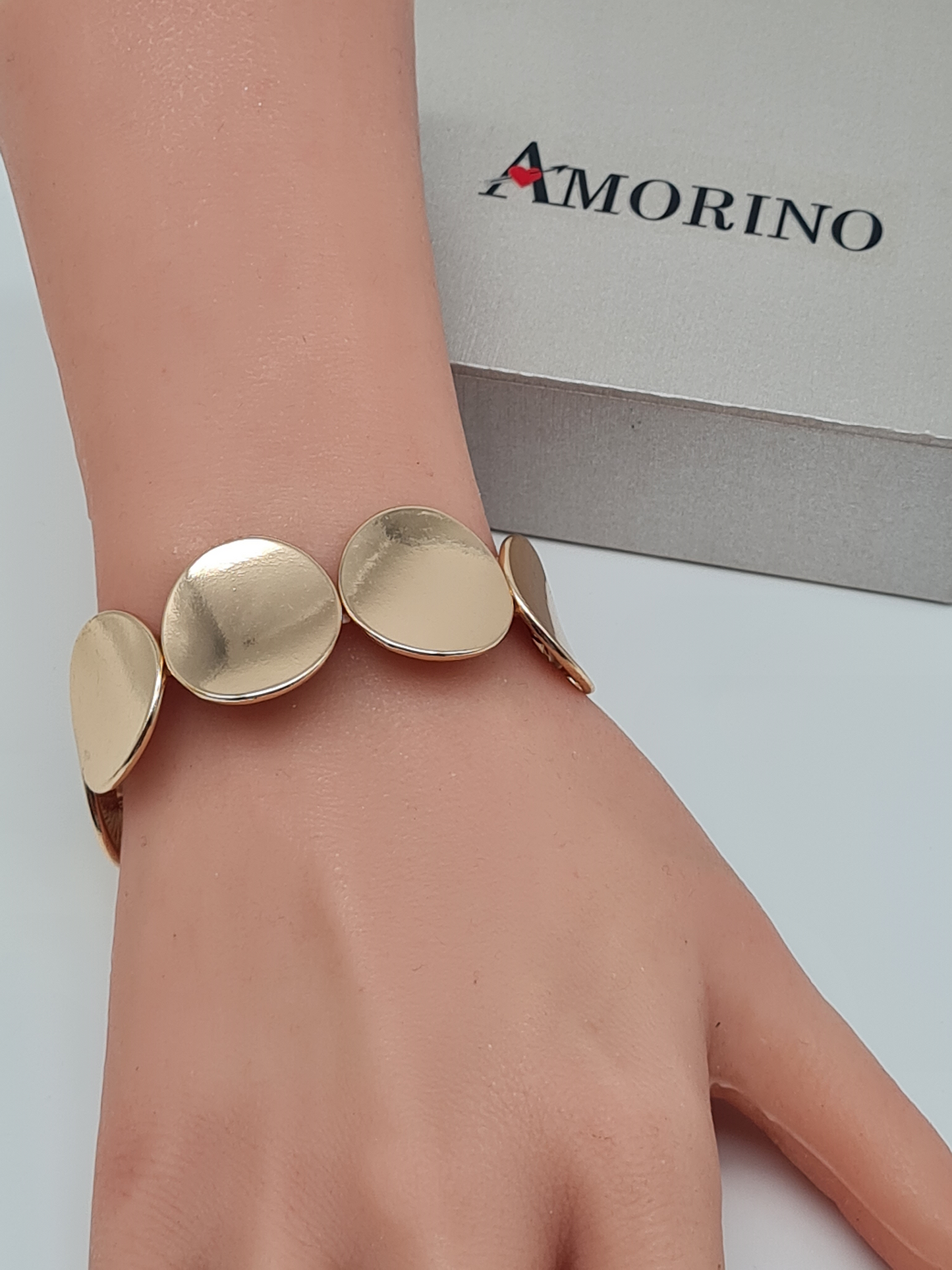 Amorino Armband, elastisch mit Goldfarbene glänzenden Kreis Elementen