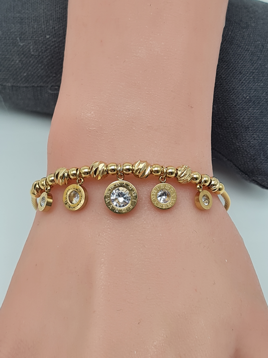 Cosmos Armreif Feiner goldener Armreif mit runden Anhängern und Kristall
