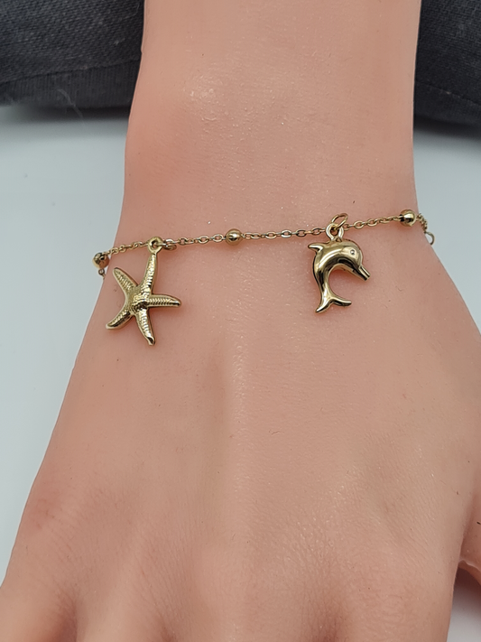 Cosmos Armband, Goldfarbenes feines Bettelarmband mit Meerestiere