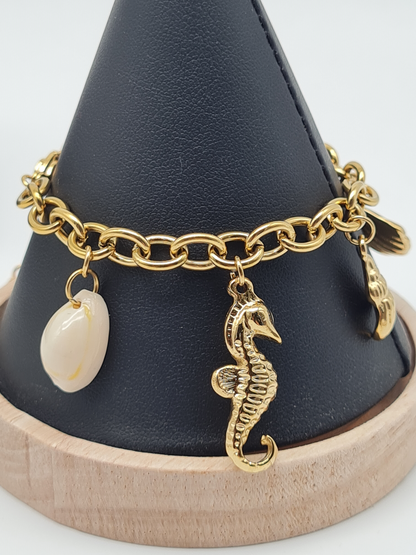 Cosmos Armband, Goldfarbenes Gliederarmband mit Meeresüberraschungen