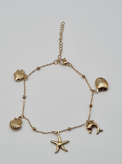 Cosmos Armband, Goldfarbenes feines Bettelarmband mit Meerestiere