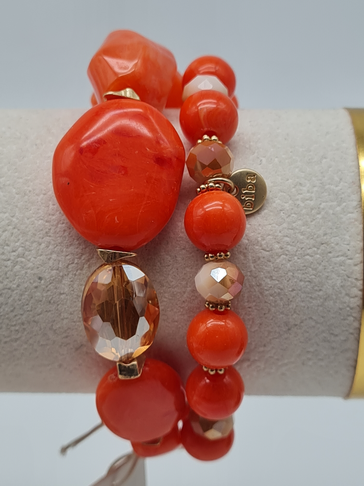 Biba Perlenarmband, Doppelkette mit verschieden Größen Orange Perlen