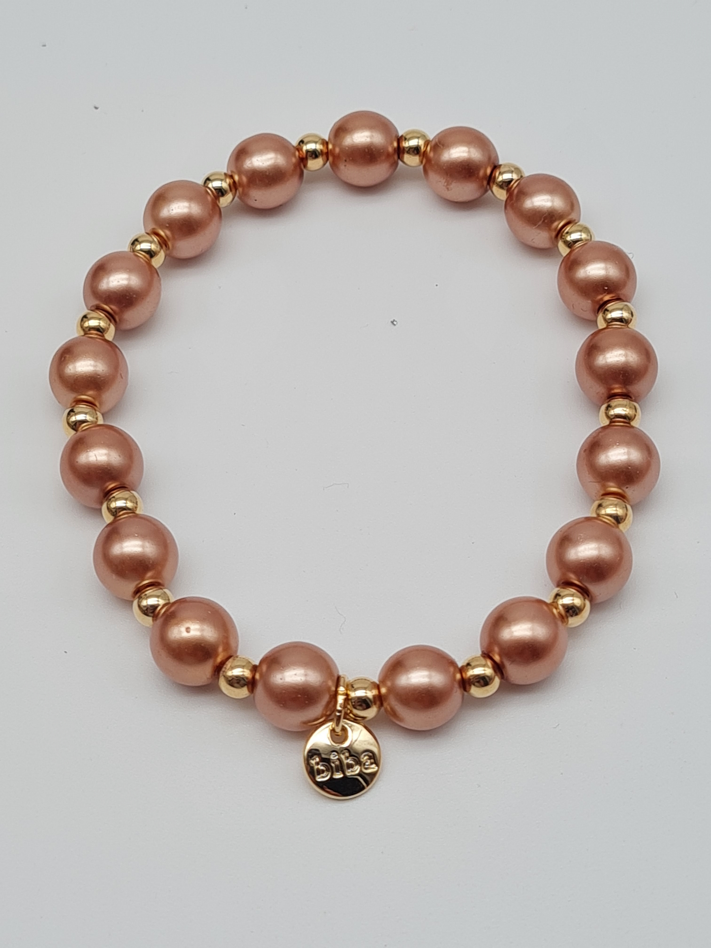 Biba Armband elastisch Lachs-Rosa mit Goldfarben in 3 Größen