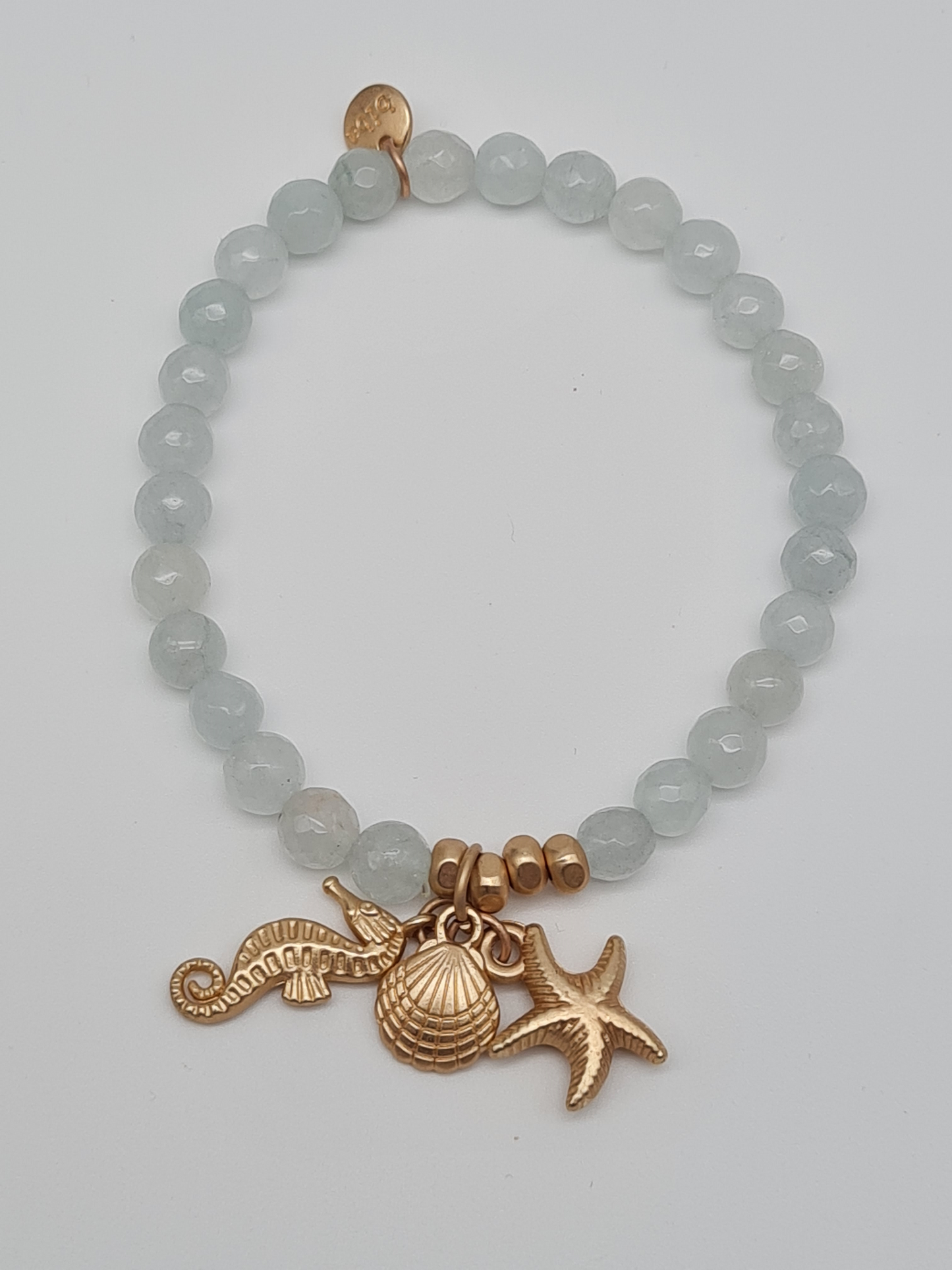 Biba Armband elastisch Helltürkis oder Hellblau mit Anhänger, Muschel, Seestern, Seepferdchen