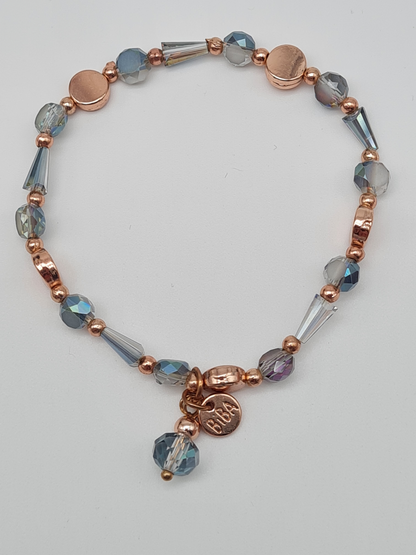 Biba Armband elastisch Hellblaue Transparente Goldene oder Roségoldene Elementen mit Anhänger
