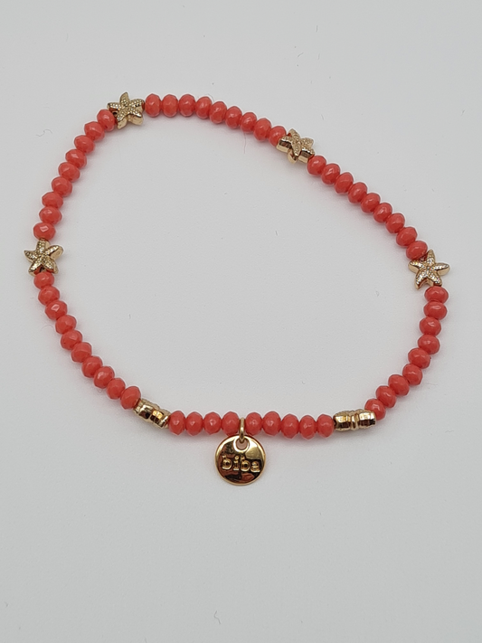 Biba Armband elastisch Filigran Korallenfarbe mit Goldfarbene Seesternchen