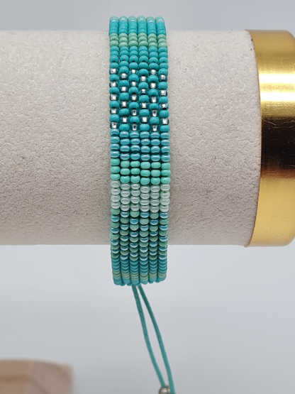 Biba Armband Freundschaftsarmband mit Blau- Türkisen eingewebte Perlen