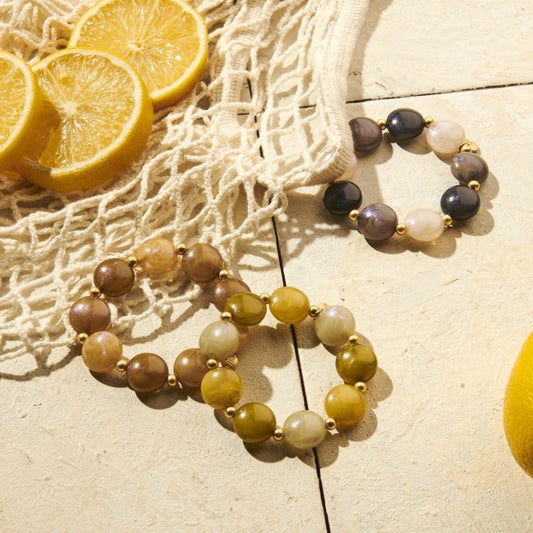 Biba Armband elastisch in Braun-Natur oder Lila-Töne mit Mat-Goldene Perlchen