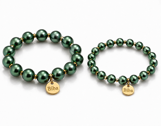 Armband elastisch Grün goldfarbene Perlen elegant Trend Sommer Biba
