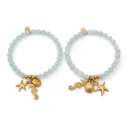 Armband elastisch Helltürkis Hellblau Anhänger Muschel Seestern Seepferdchen Biba