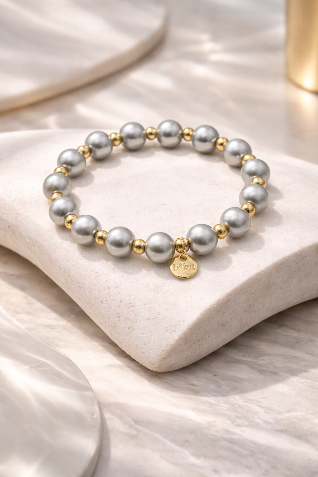 Armband elastisch Silbergrau mit Goldfarben in 3 Größen Trend Sommer Biba