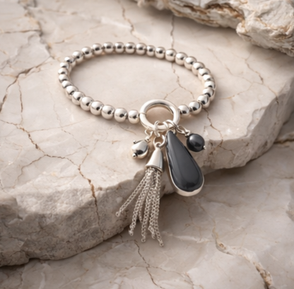Armband Silberfarben grau nickelfrei stretch elastisch Anhänger Biba