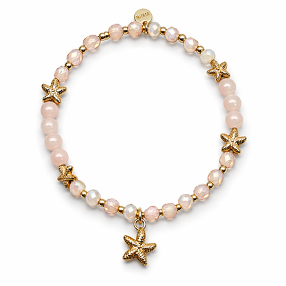Armband elastisch Blassrosa goldene Seesternen Anhänger Trend Sommer Biba